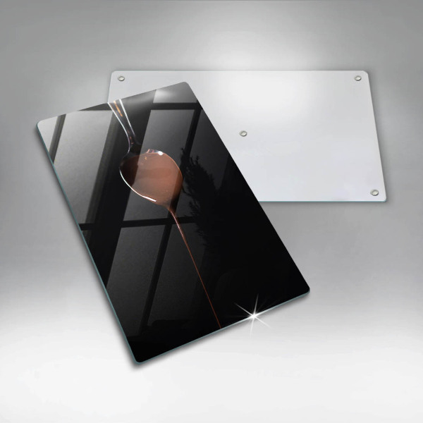 Chopping board glass Spoon of chocolate