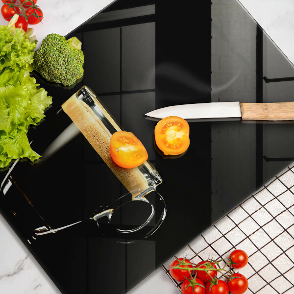 Chopping board glass A glass of black coffee