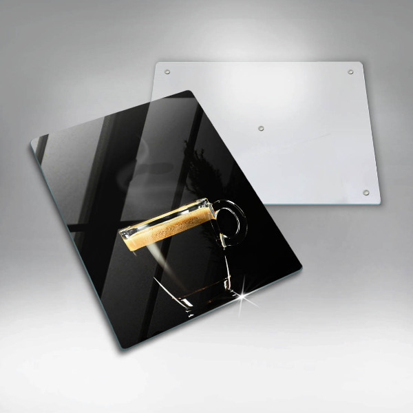 Chopping board glass A glass of black coffee