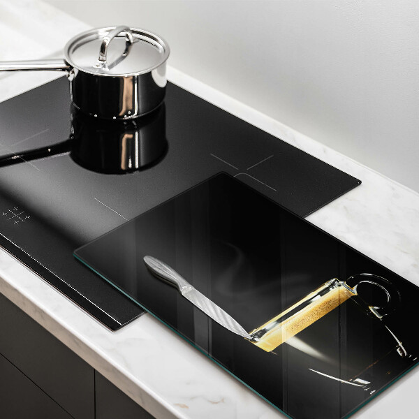 Chopping board glass A glass of black coffee