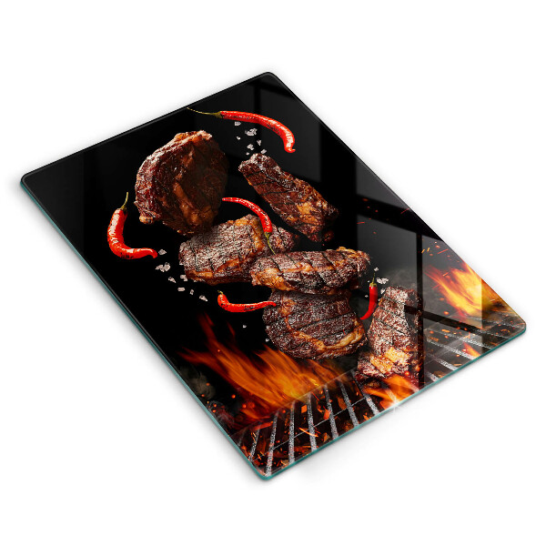 Chopping board glass Meat on the grill
