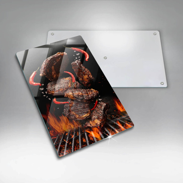 Chopping board glass Meat on the grill