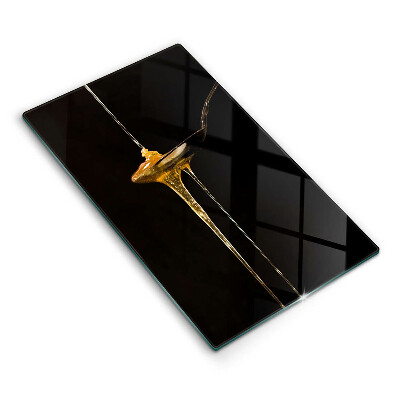 Chopping board glass A teaspoon of honey