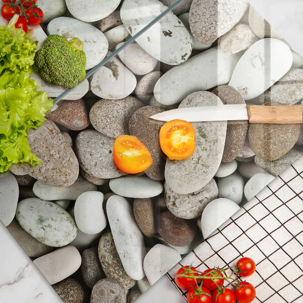 Glass chopping board Background small stones
