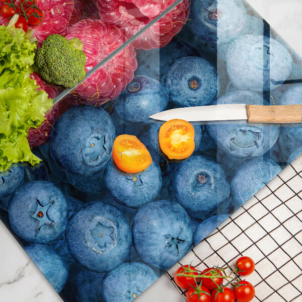 Chopping board Fruit of raspberry and blueberries