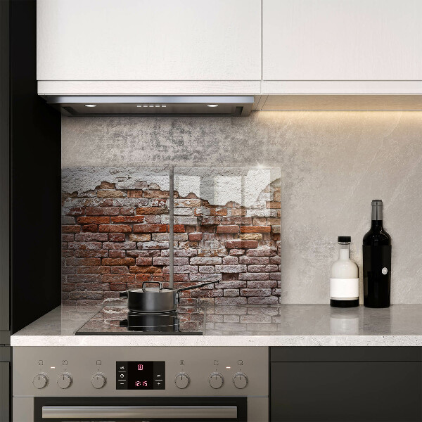 Glass chopping board Old wall of brick and concrete