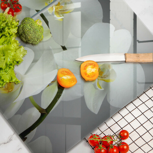 Glass chopping board White orchid flowers