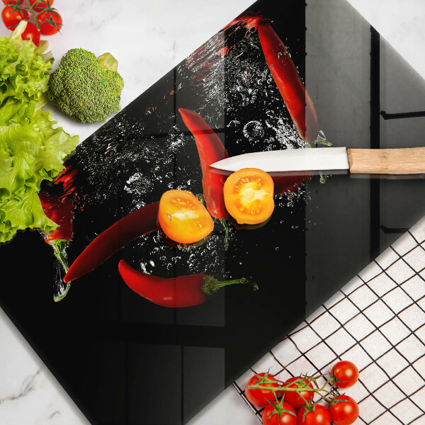 Chopping board Chili peppers in water