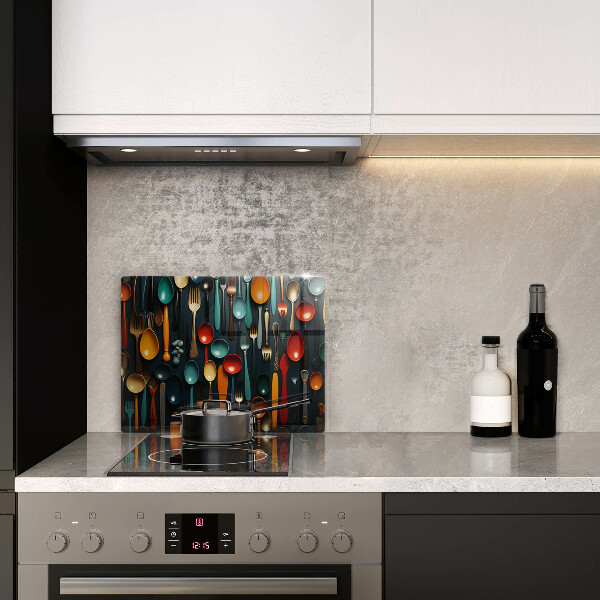 Chopping board Colorful spoons and forks