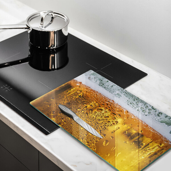 Chopping board Wet glass of beer