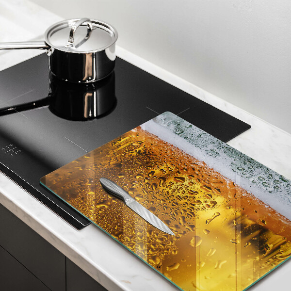 Chopping board Wet glass of beer