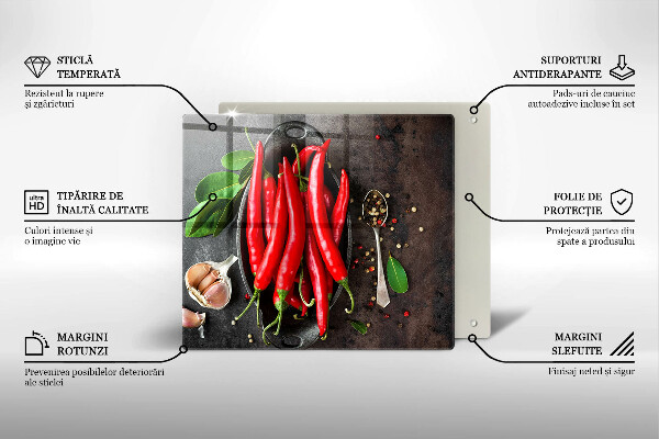 Chopping board glass Red chili peppers