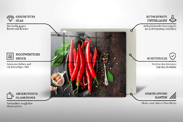 Chopping board glass Red chili peppers