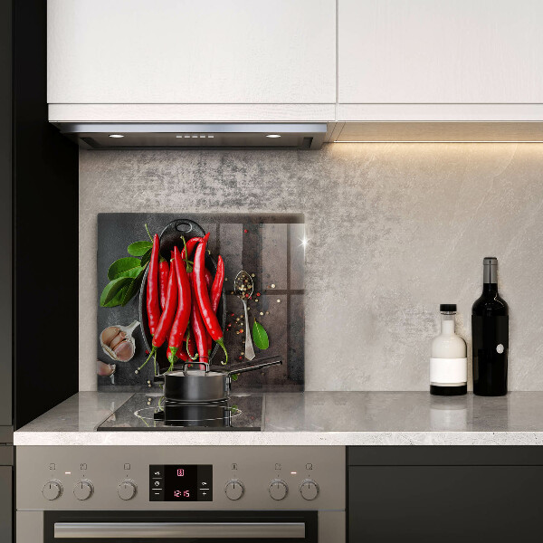 Chopping board glass Red chili peppers