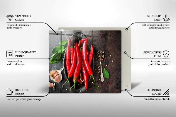 Chopping board glass Red chili peppers