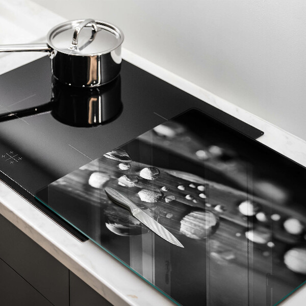 Glass worktop saver Drops of dew on the leaves