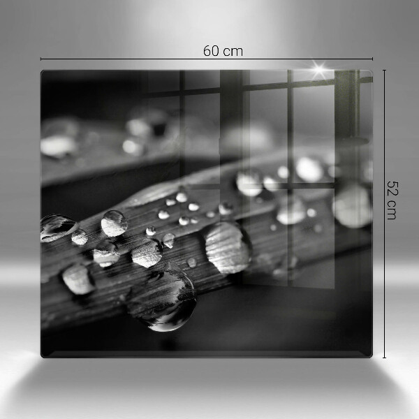 Glass worktop saver Drops of dew on the leaves