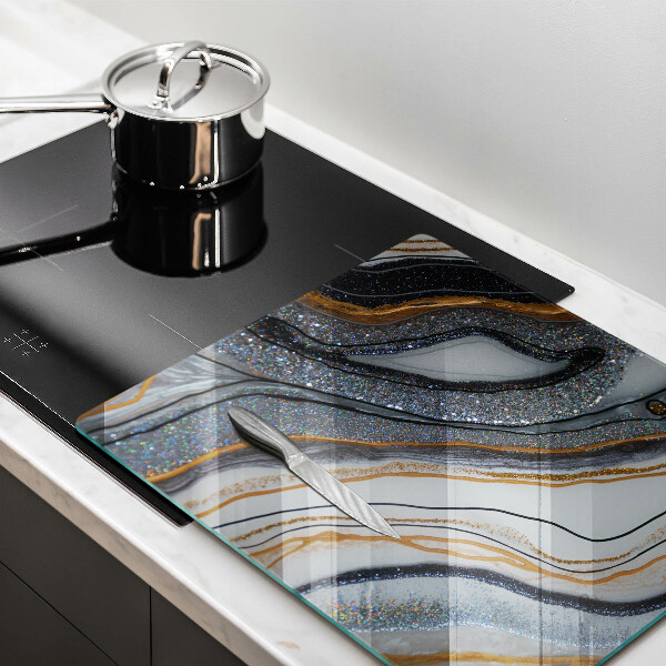 Glass worktop saver rock with gold