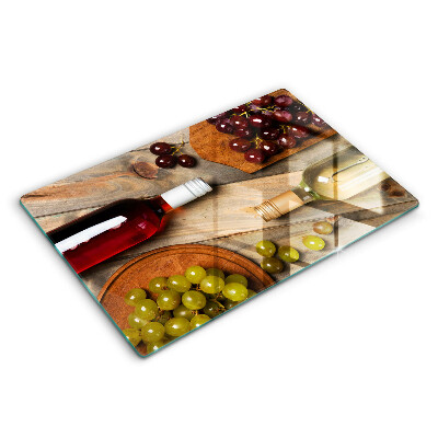 Cutting board Bottles of wine and grapes