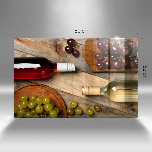Cutting board Bottles of wine and grapes