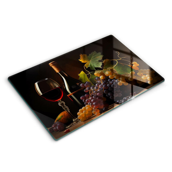 Cutting board A glass of wine and grapes