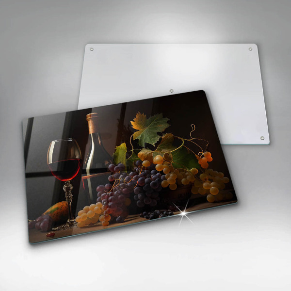 Cutting board A glass of wine and grapes