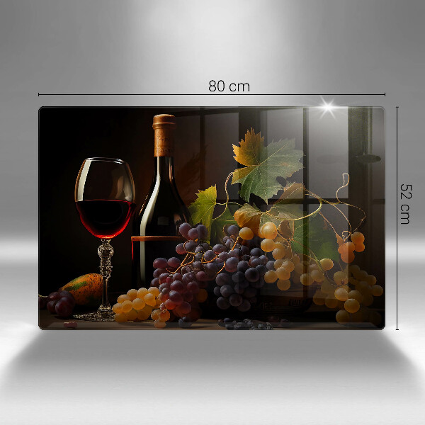 Cutting board A glass of wine and grapes