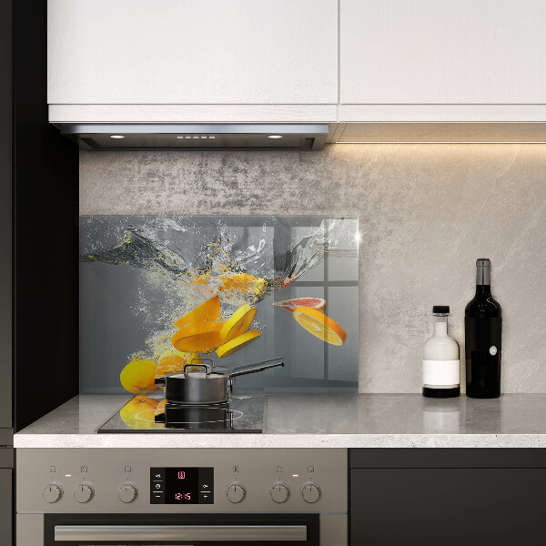 Chopping board glass Lemons in water