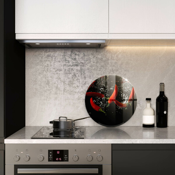 Chopping board glass Chili peppers in water