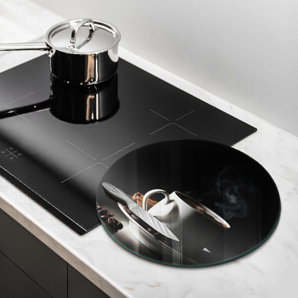 Chopping board glass A cup of hot coffee