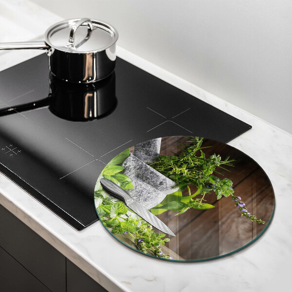 Chopping board glass Herbs plants and wood