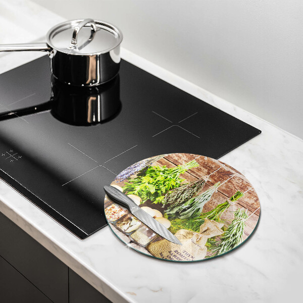 Chopping board glass Herbs spices and wood