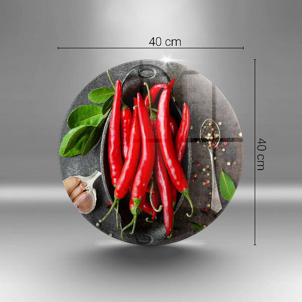 Chopping board glass Red chili peppers