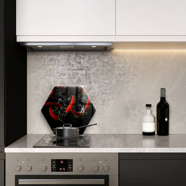 Chopping board glass Chili peppers in water