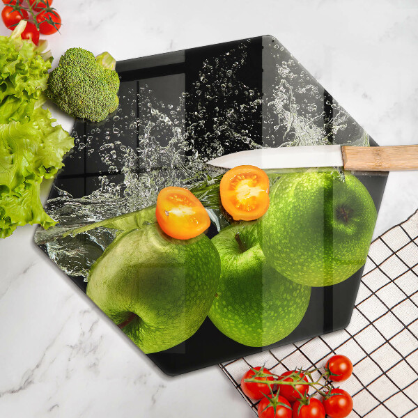 Chopping board glass Green apples and water