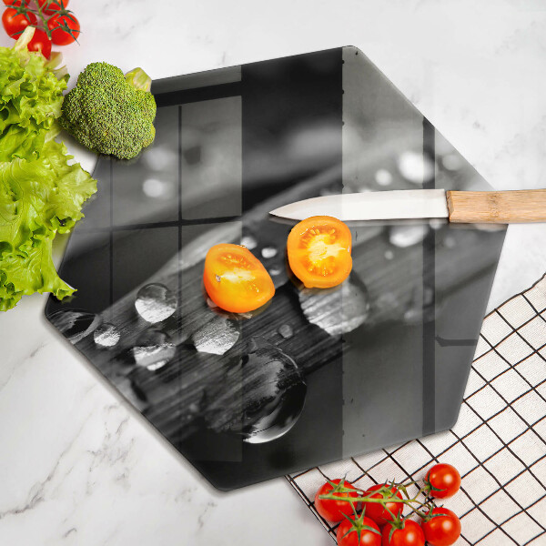 Glass chopping board Drops of dew on the leaves