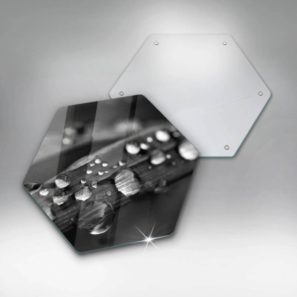 Glass chopping board Drops of dew on the leaves