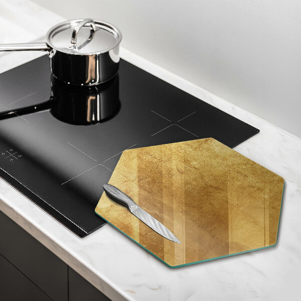 Chopping board glass Gold texture background