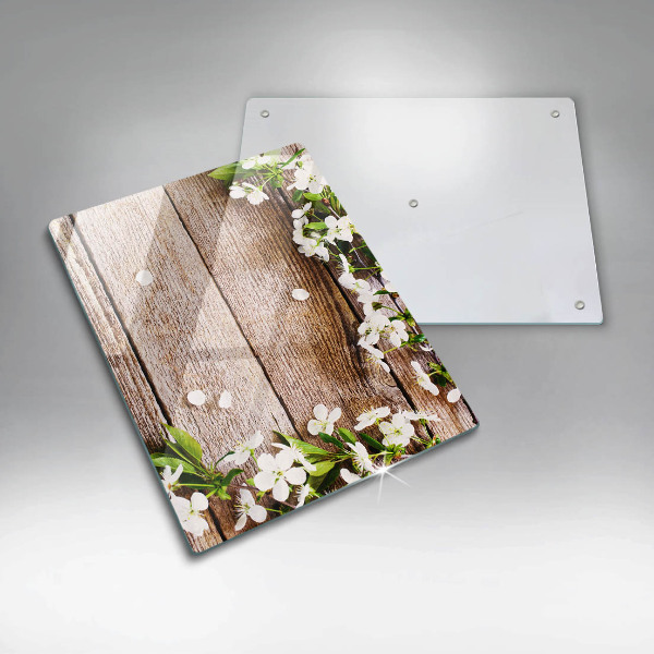 Induction hob protector White flowers on the boards