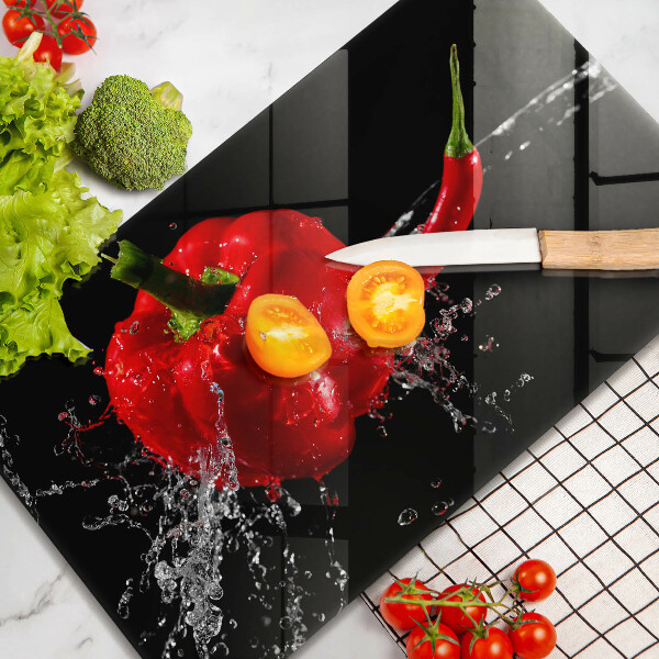 Worktop saver Red peppers in water
