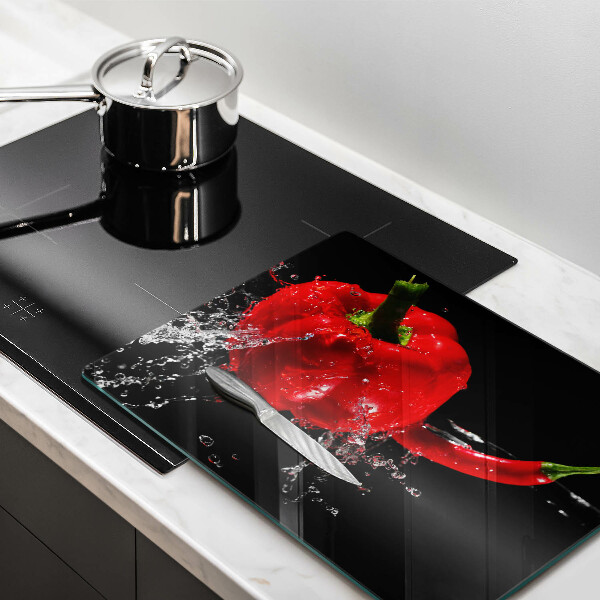 Worktop saver Red peppers in water