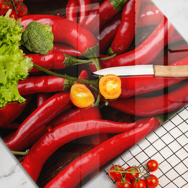 Glass kitchen board Hot chili peppers