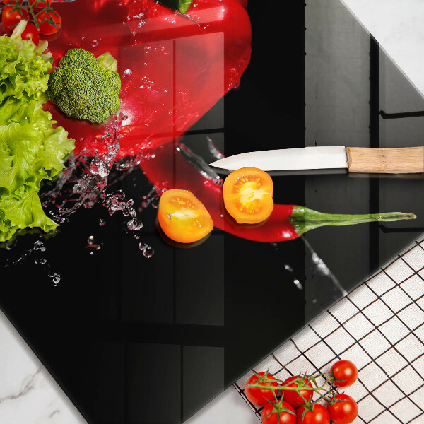 Kitchen worktop saver Red peppers in water