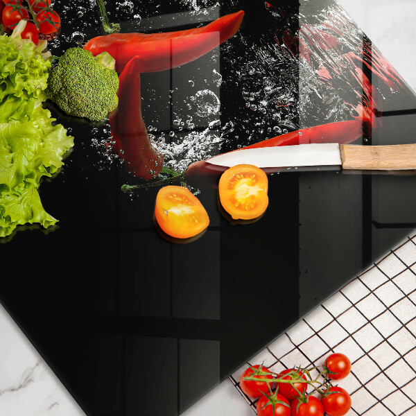 Induction hob protector Chili peppers in water