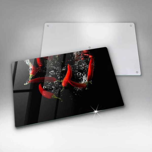 Induction hob protector Chili peppers in water