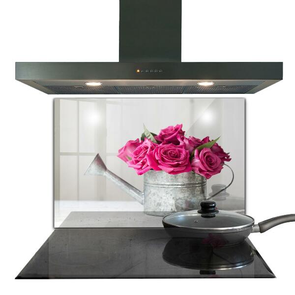 Kitchen splashback Watering can with a bouquet of roses