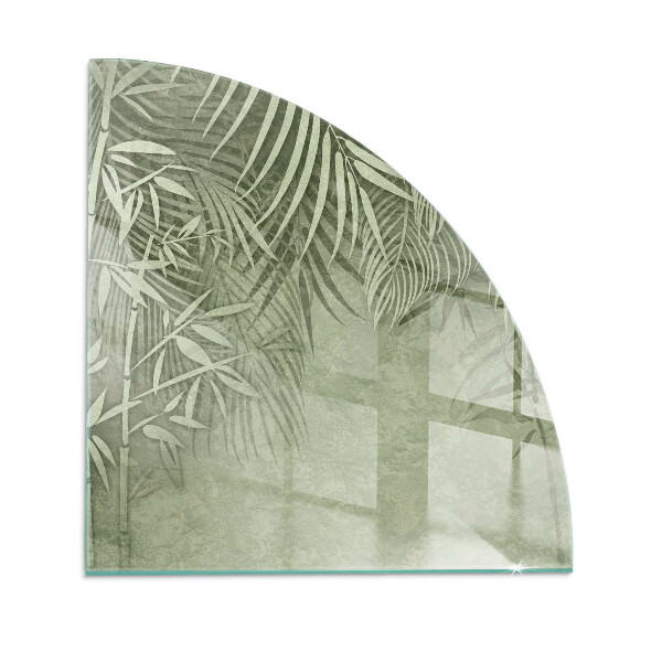 Quarter-circle toughened glass hearths Tropical leaves in the background