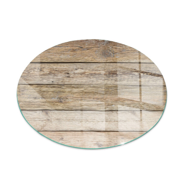 Round glass hearths for wood burners Wooden board in the layout