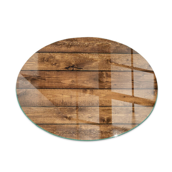 Round glass fire hearth Wooden board with grain