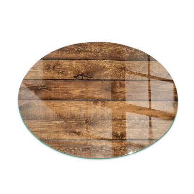 Round glass fire hearth Wooden board with grain